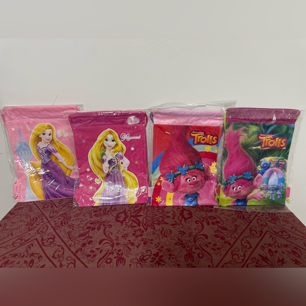 licensed DreamWorks Trolls and Disney Princess Rapunzel drawstring bags 4 set